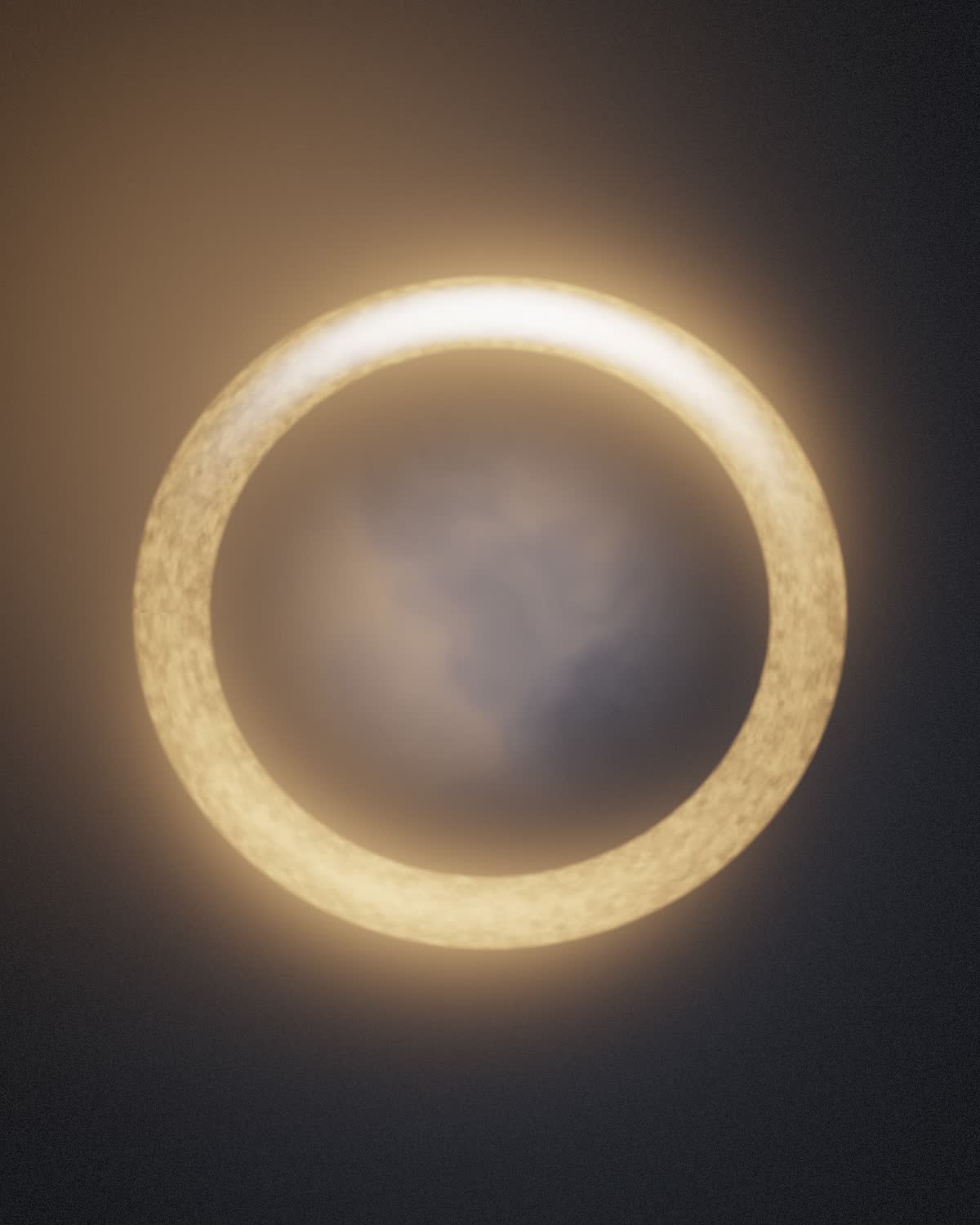 The AETHER ONE ring glowing against darkness, its interior filled with soft light.